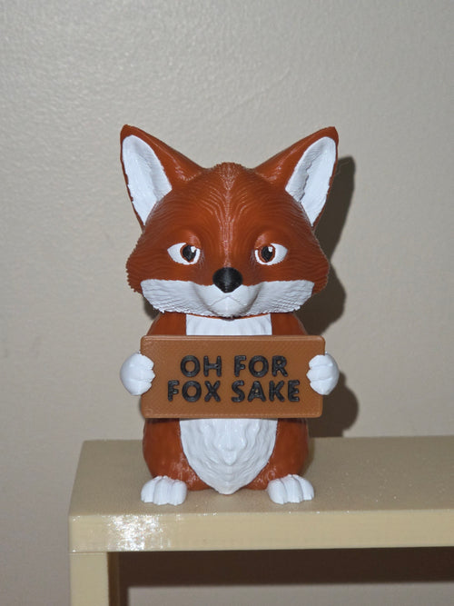 Fox holding a sign that says OH FOR FOX SAKE